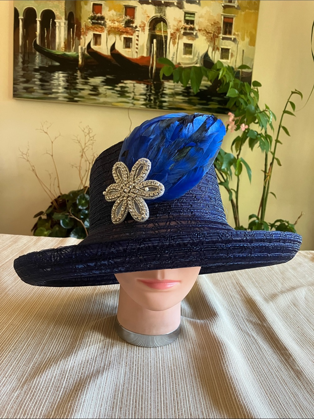 Elegant Navy Hat with Blue Feather and Silver Rhinestone Beaded Flower Motif